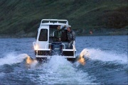 The President of Russia Vladimir Putin has leaded his week-end with the Prime Minister Dmitry Medvedev on the Grizzly boat. 